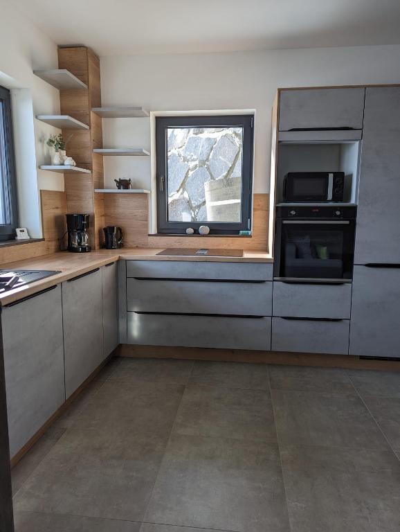 Kuchyň nebo kuchyňský kout v ubytování Apartment Talblick