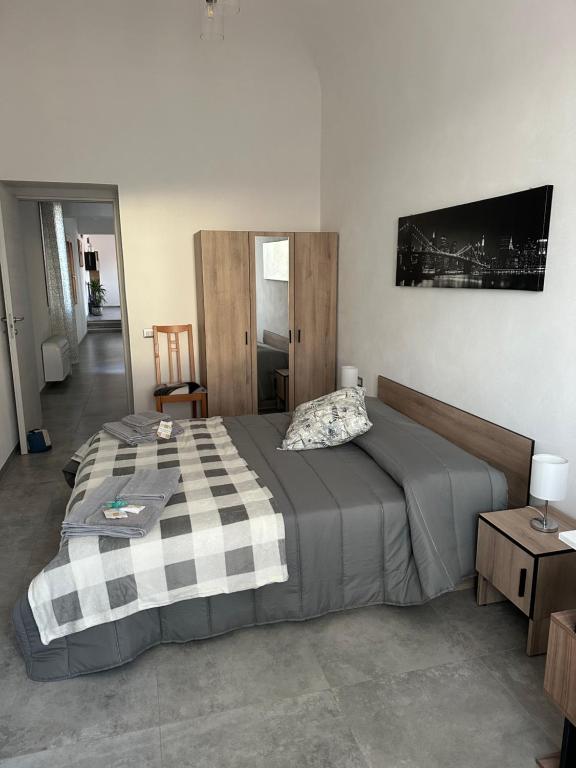 Postel nebo postele na pokoji v ubytování LA SCALINATA