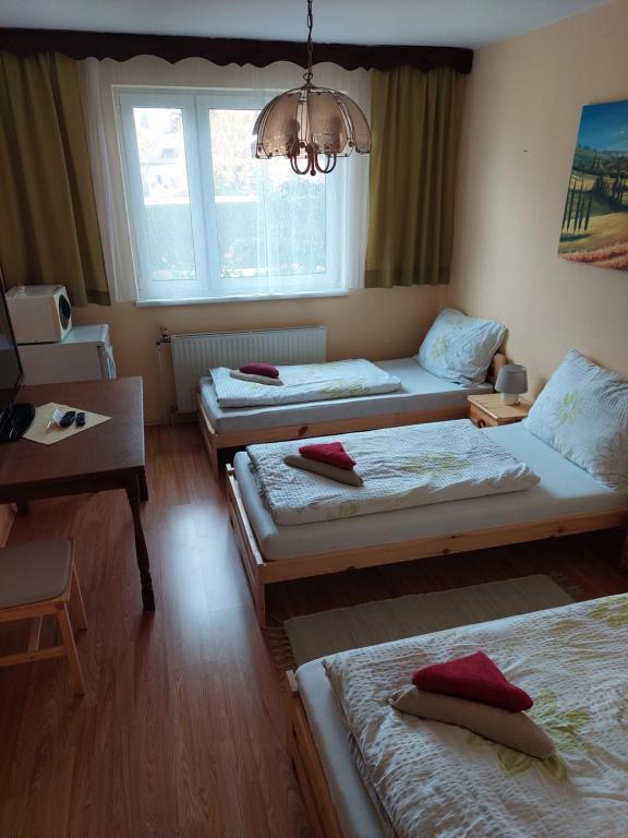 Posteľ alebo postele v izbe v ubytovaní Pension Welserhof