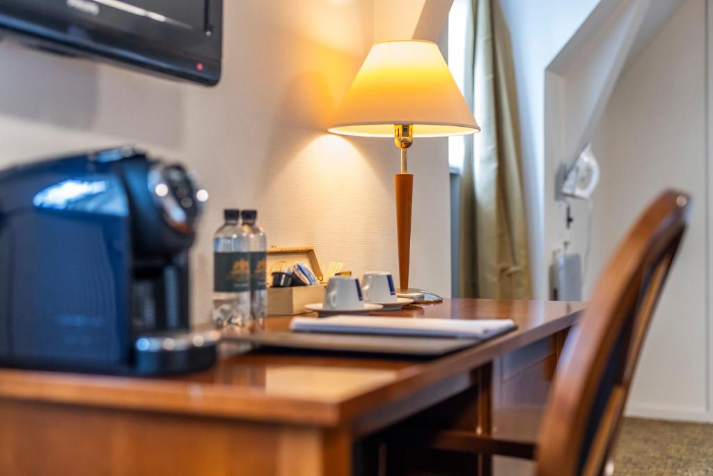 Kuchyň nebo kuchyňský kout v ubytování Hotel Tønderhus
