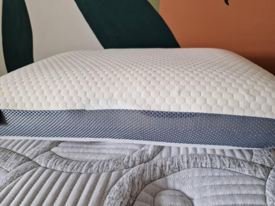 Postel nebo postele na pokoji v ubytování Logement 4 pièces Étang St Paul