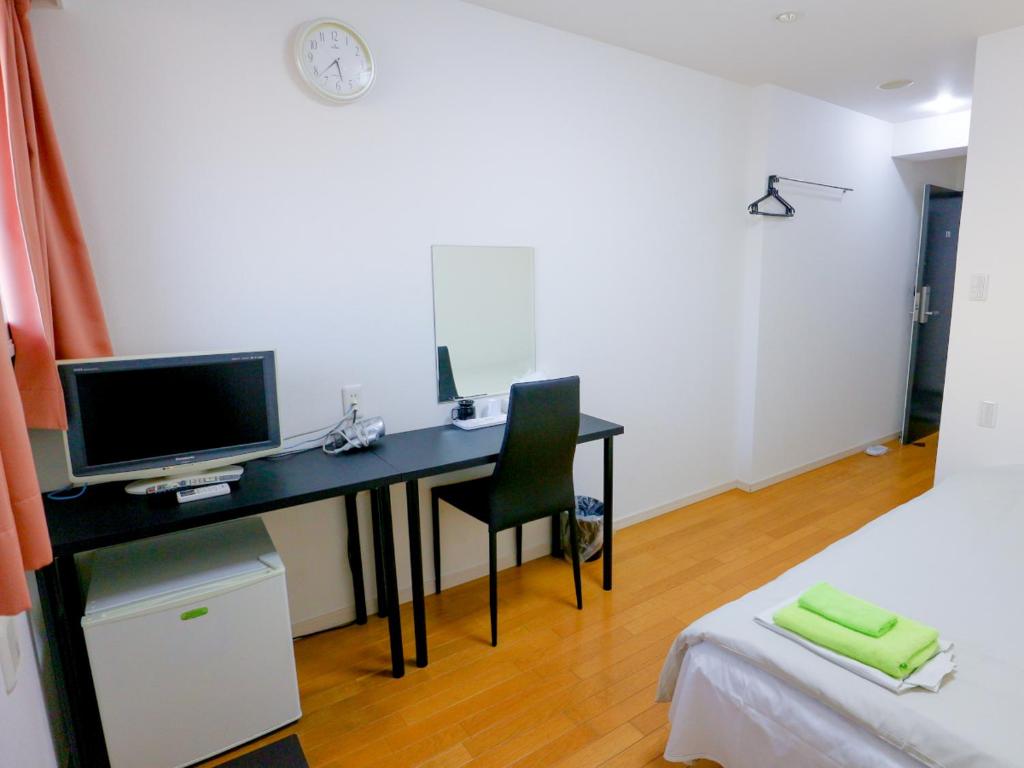 TV a/nebo společenská místnost v ubytování ホテル中央セレーネ Hotel CHUO SELENE