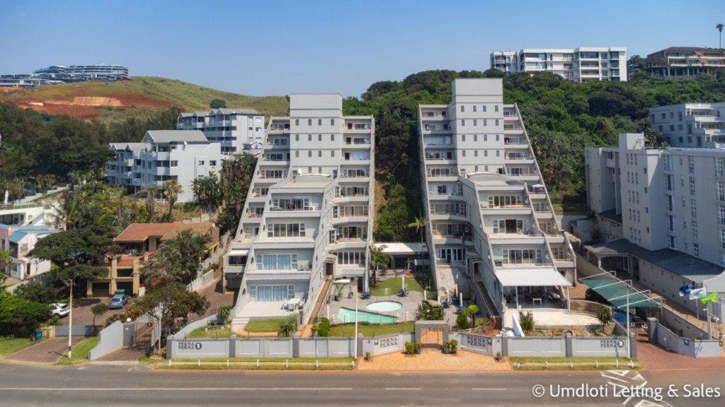 an aerial view of buildings in a city at Coastal Nest in Durban North