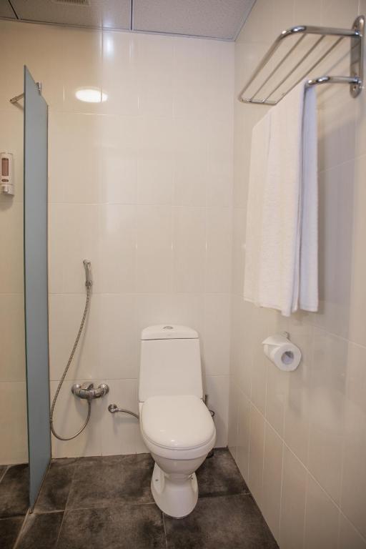 Koupelna v ubytování Cascade Hotel
