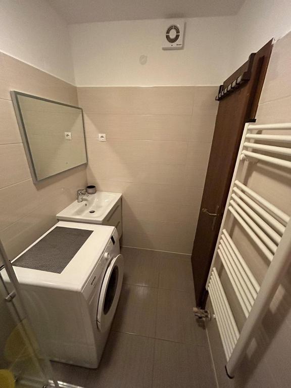 Koupelna v ubytování Apartments Dino