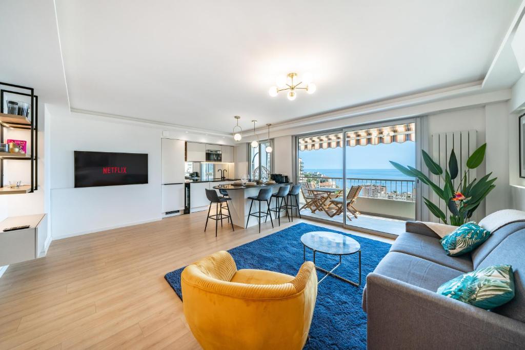 Telewizja i/lub zestaw kina domowego w obiekcie Baie de Monaco - Terrasse vue mer - Parking - AF