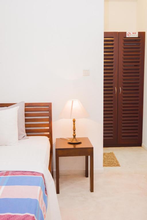 Rúm í herbergi á Hotel Vibration