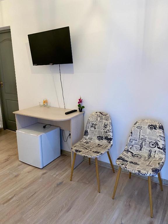TV a/nebo společenská místnost v ubytování InnTime
