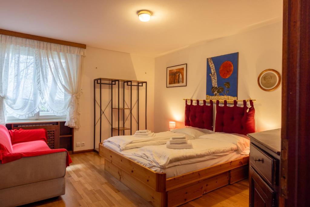 A bed or beds in a room at Casa Alverà