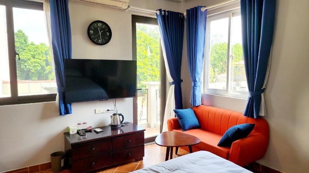 TV o dispositivi per l'intrattenimento presso T Home Balcony Homestay
