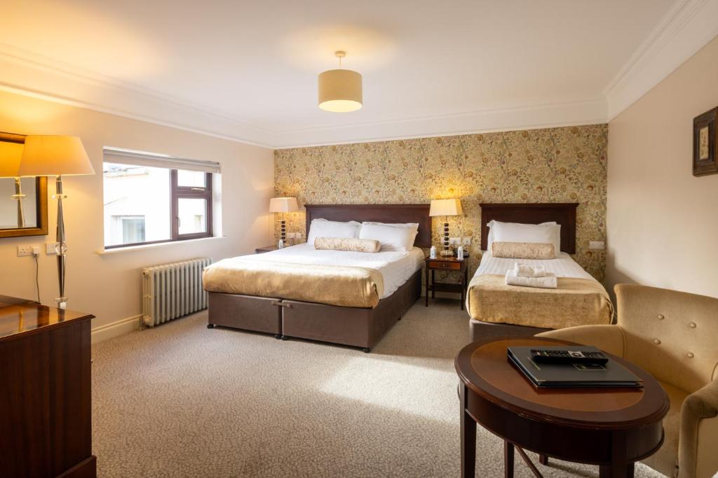 Ένα ή περισσότερα κρεβάτια σε δωμάτιο στο West Cork Hotel