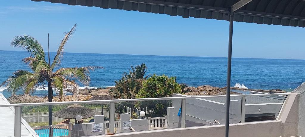 a view of the ocean from a balcony at Libra Holiday Flats 1 in Margate