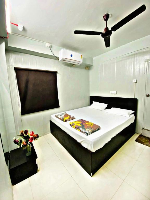 Postel nebo postele na pokoji v ubytování Homestay Ac Dormitory