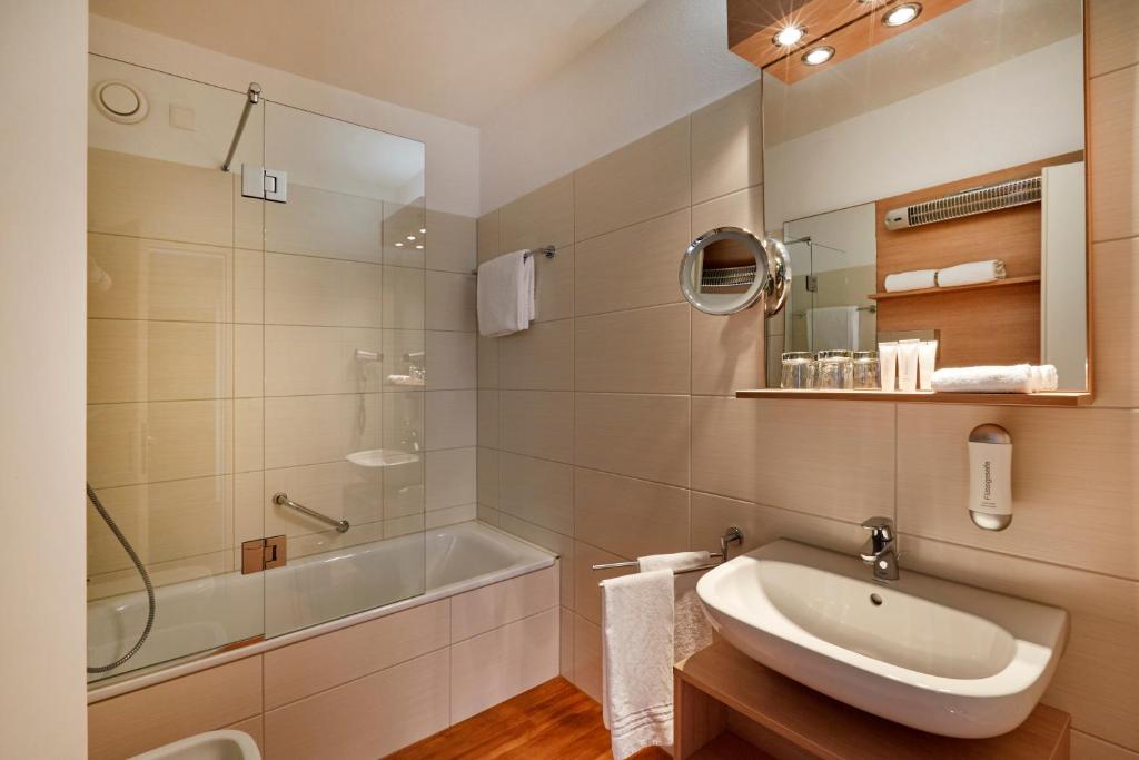 Koupelna v ubytování H4 Hotel Arcadia Locarno