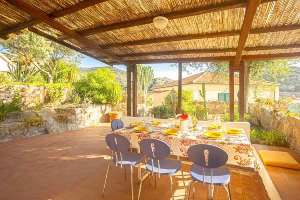 a table and chairs sitting on a patio at Silva in Campese