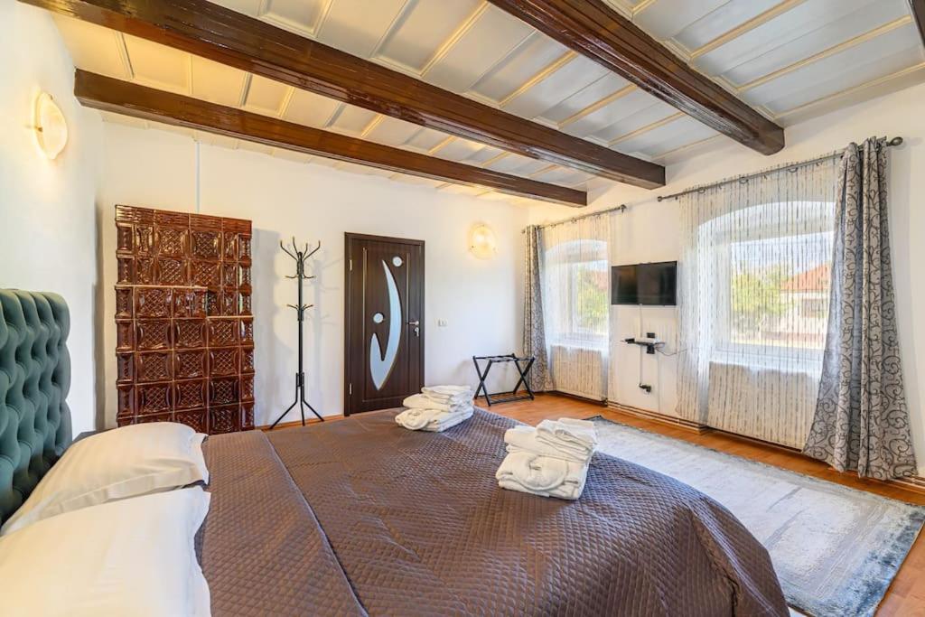 Postel nebo postele na pokoji v ubytování Alexander House