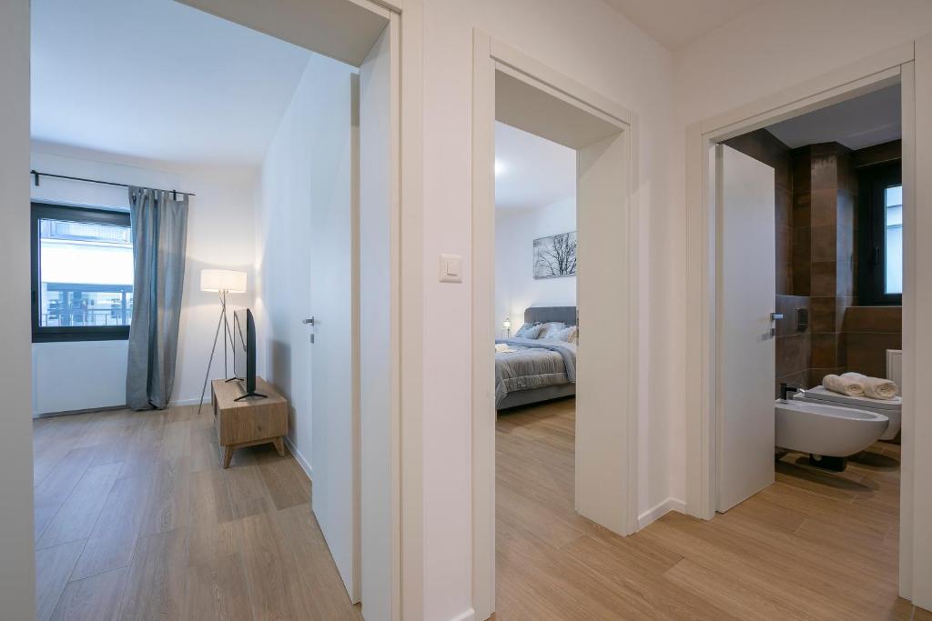 Postel nebo postele na pokoji v ubytování Boutique Apartments