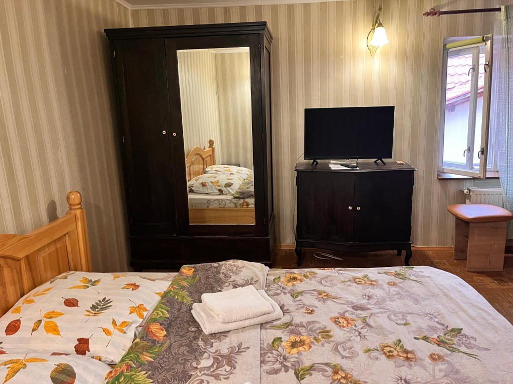 Postel nebo postele na pokoji v ubytování Mala Praha