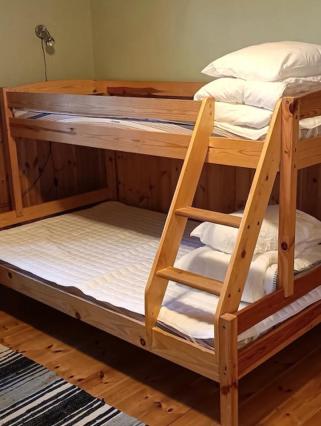 Postel nebo postele na pokoji v ubytování Årsunda Strandbad