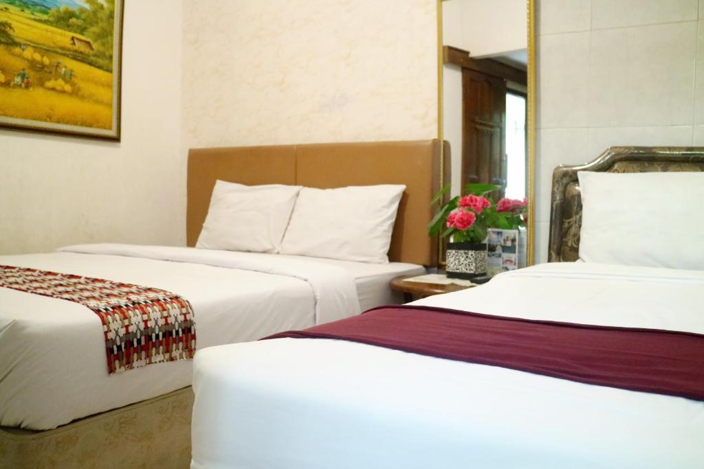 The Homey Rooms and Tours - Chambre Triple Avec Vue Sur Jardin