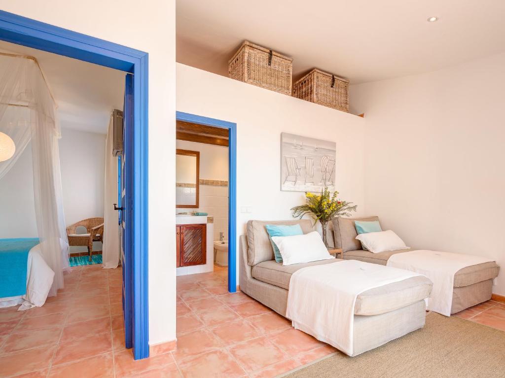A bed or beds in a room at Blue Home