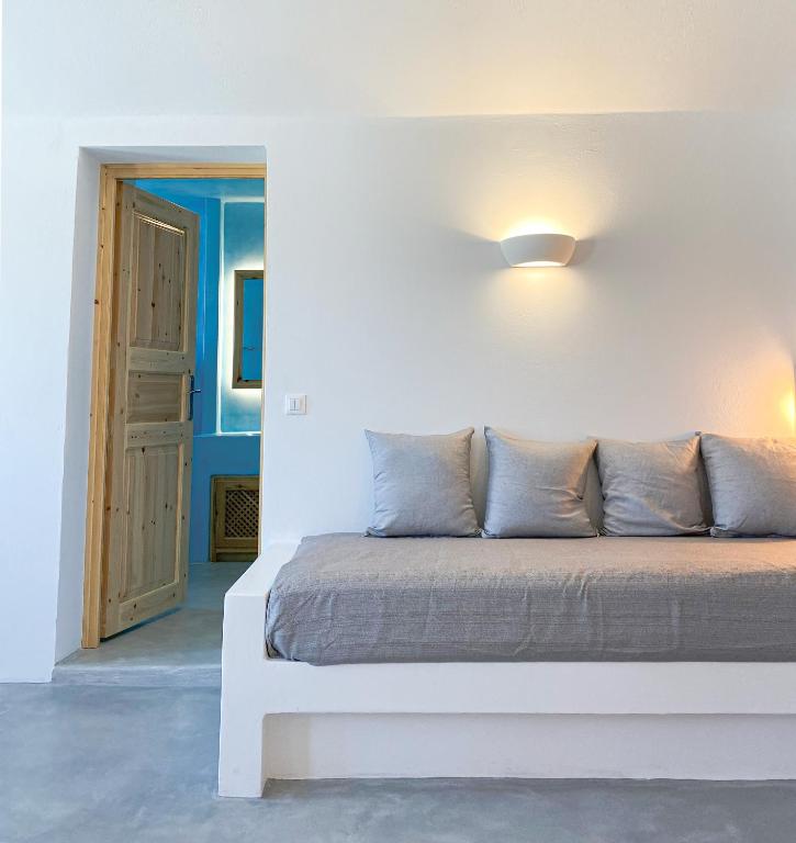 Postel nebo postele na pokoji v ubytování Villas Scirocco