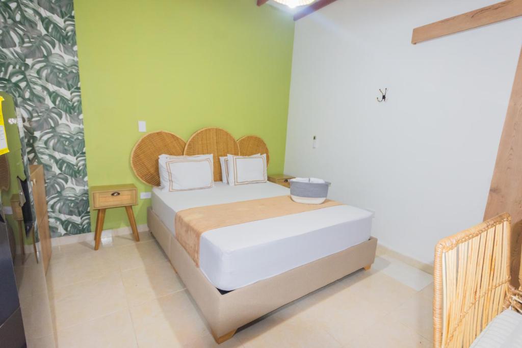 Postel nebo postele na pokoji v ubytování La Casona Hotel Boutique
