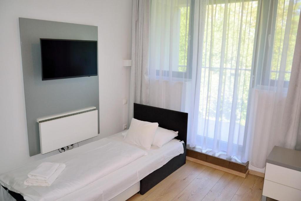 Posteľ alebo postele v izbe v ubytovaní Zamárdi TOK