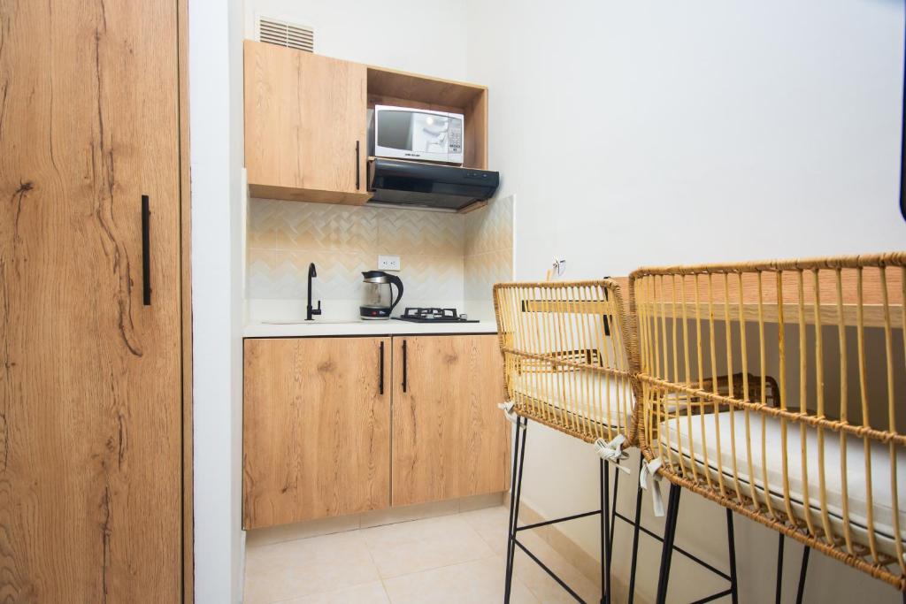 Kuchyň nebo kuchyňský kout v ubytování La Casona Hotel Boutique