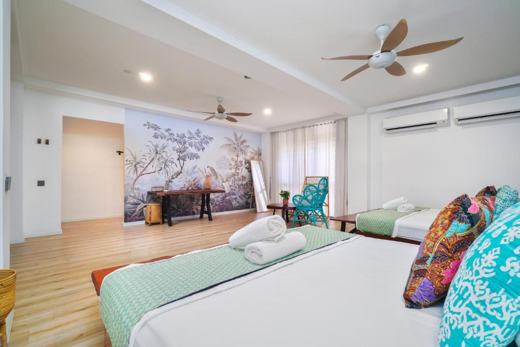 Giường trong phòng chung tại Villapadu Bayu