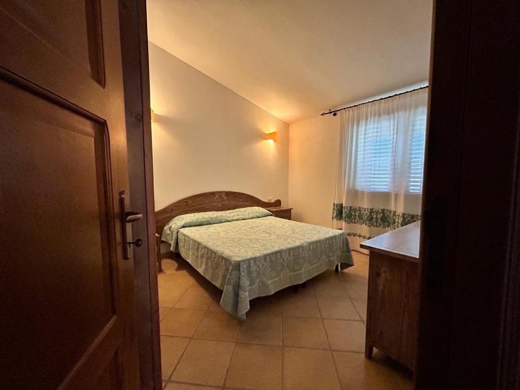 Postel nebo postele na pokoji v ubytování Hotel I Menhirs