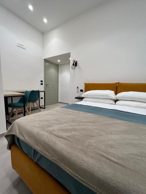 La Stella Di Napoli B&B tesisinde bir odada yatak veya yataklar