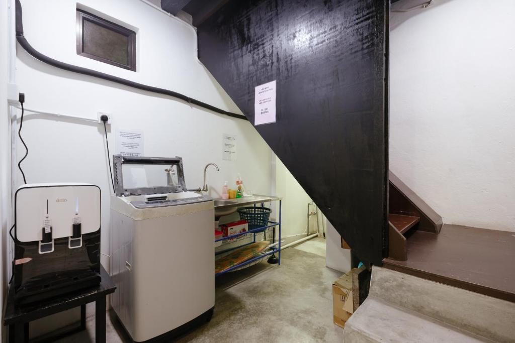 Postel nebo postele na pokoji v ubytování Kangsar Inn 73