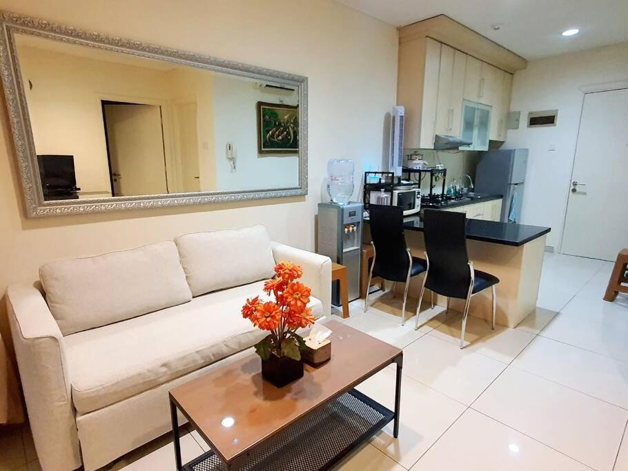 Η κουζίνα ή μικρή κουζίνα στο Central Park Residence Podomoro Condo for Four