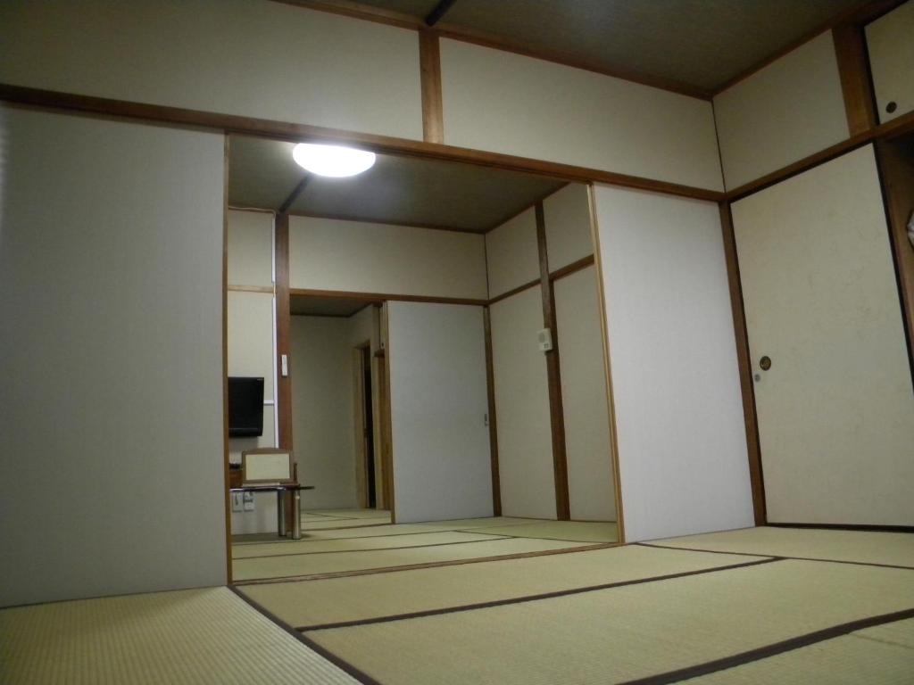 Fotografie z fotogalerie ubytování Family Ryokan Kawakyu with Showa Retro, private hot spring v destinaci Ibusuki