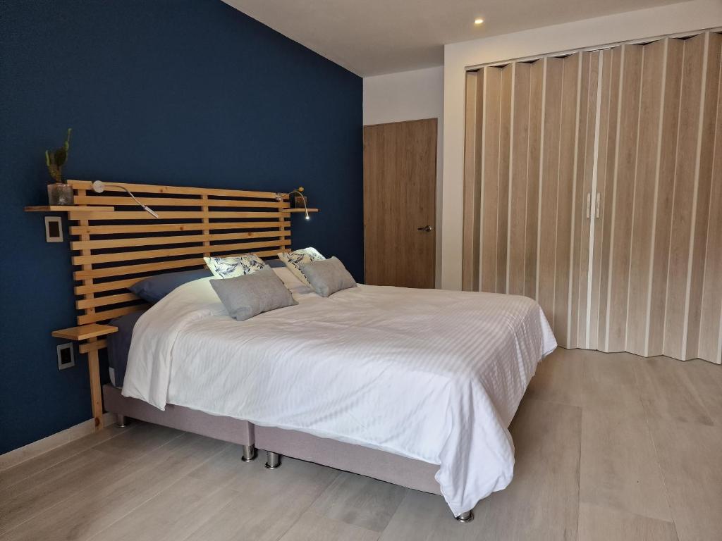 Postel nebo postele na pokoji v ubytování chez Yannick Hospedaje Los Amigos
