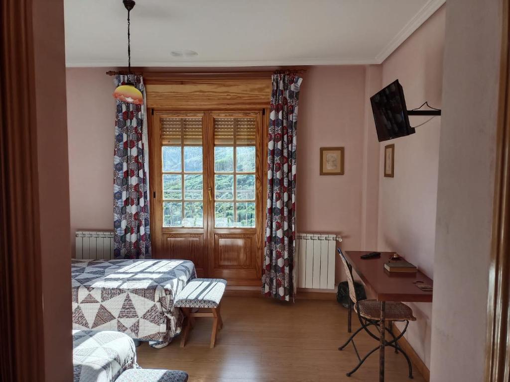 TV a/nebo společenská místnost v ubytování Hotel Pico Espiguete
