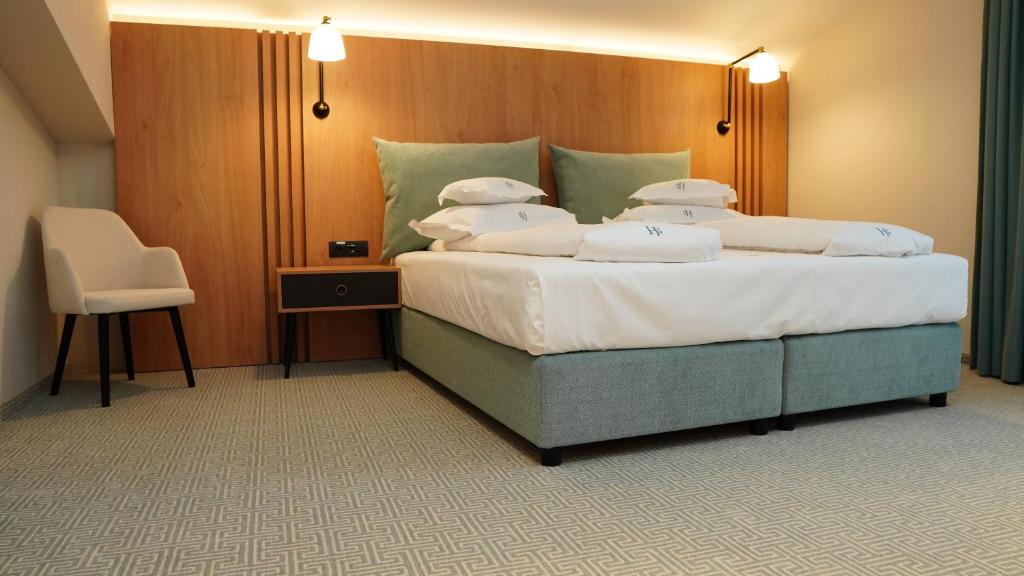 Postel nebo postele na pokoji v ubytování Hotel Sorin MIHAI