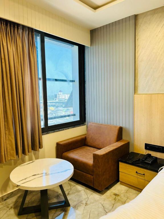 Posezení v ubytování Hotel Marigold Naroda