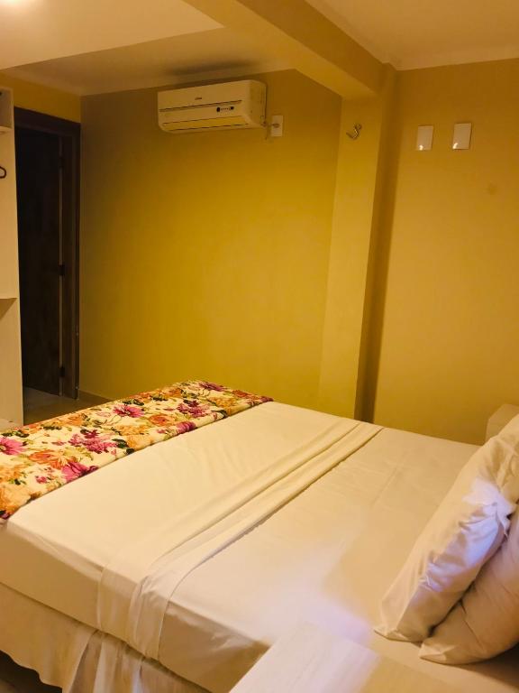 Postel nebo postele na pokoji v ubytování Hotel Pousada Latitude