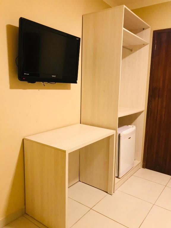 TV a/nebo společenská místnost v ubytování Hotel Pousada Latitude