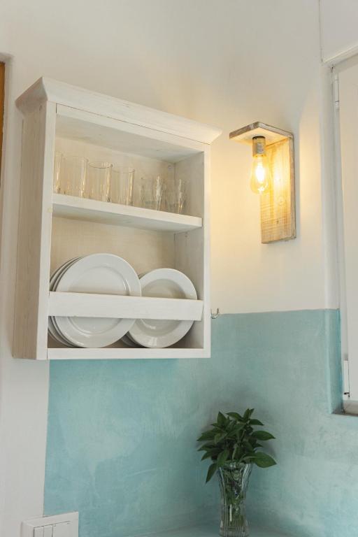 Postel nebo postele na pokoji v ubytování Villas Scirocco