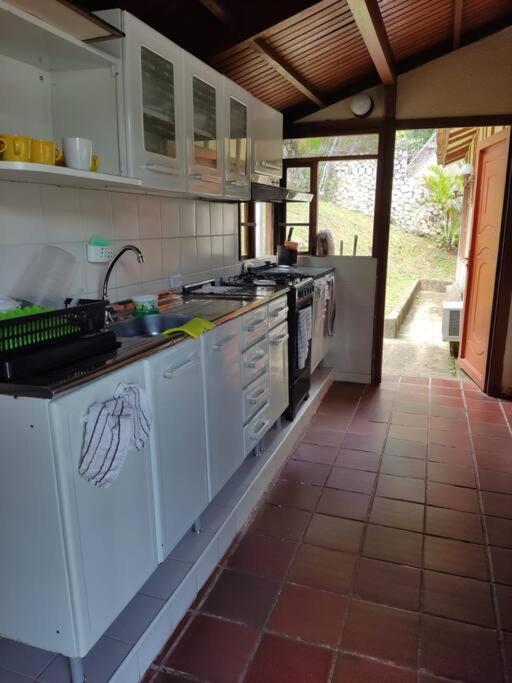 Kuchyň nebo kuchyňský kout v ubytování Las Palmeras casa en Melgar