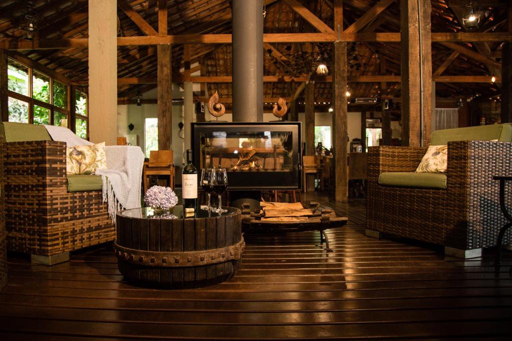 Uma área de estar em Serra do Ibitipoca Hotel de Lazer