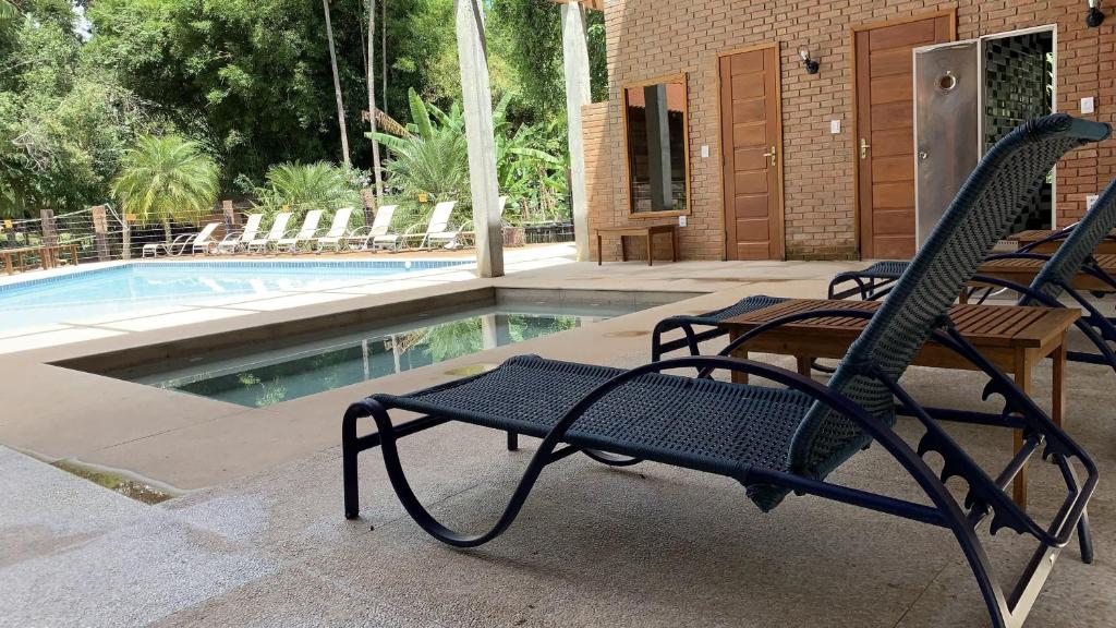 A piscina localizada em Serra do Ibitipoca Hotel de Lazer ou nos arredores
