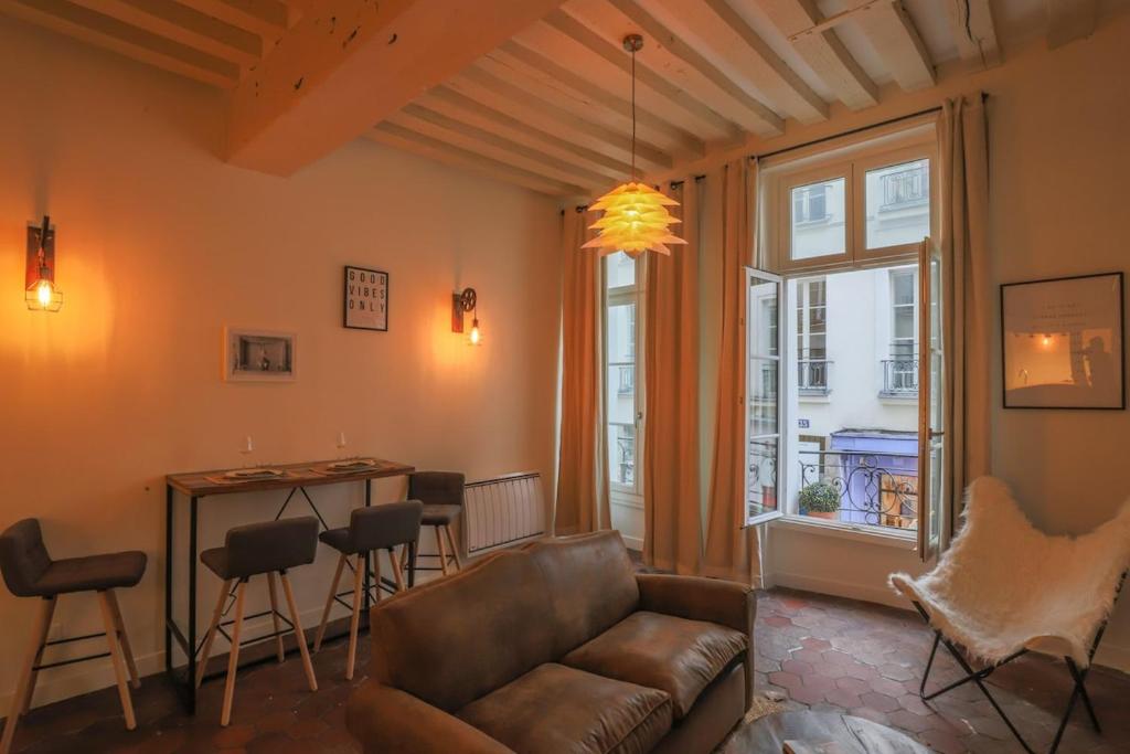 Photo de la galerie de l'établissement Le Marais - Charlot - Appartement de caractere, à Paris