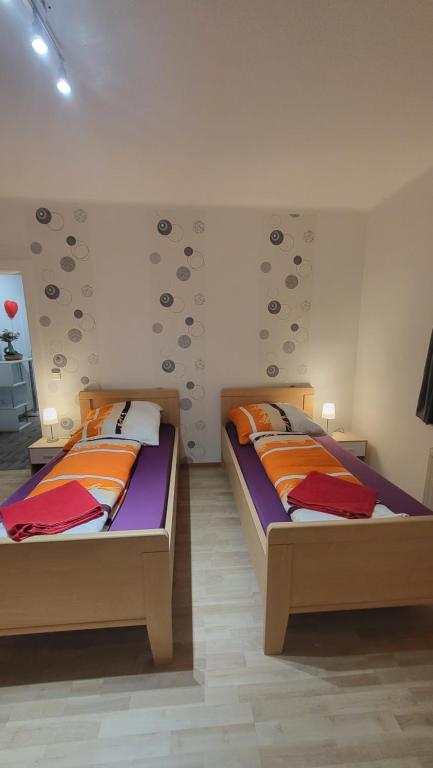 Postel nebo postele na pokoji v ubytování Gasthaus Pavillon