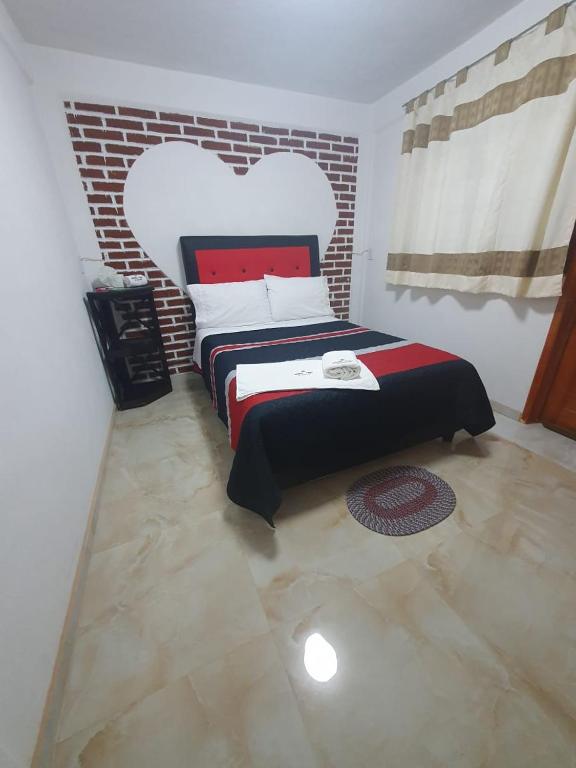 Postel nebo postele na pokoji v ubytování Hotel Fer