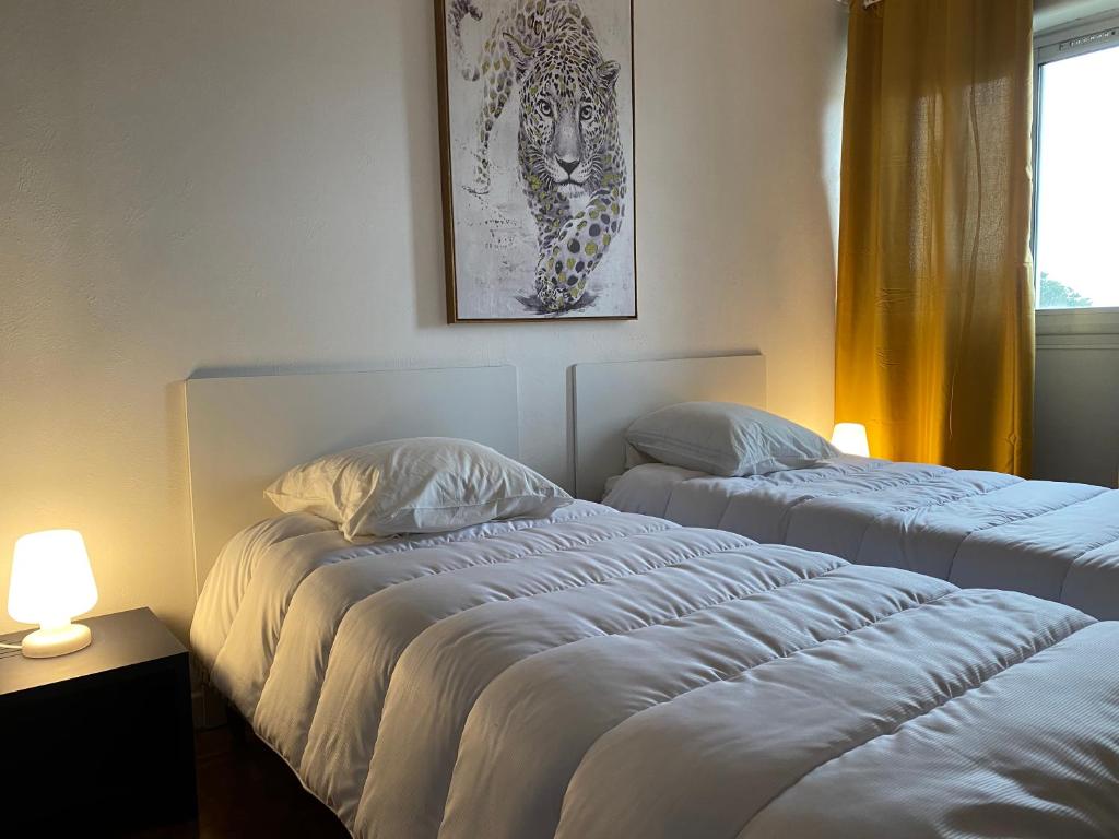Cama o camas de una habitaci&oacute;n en Appartement terrasse avec vue