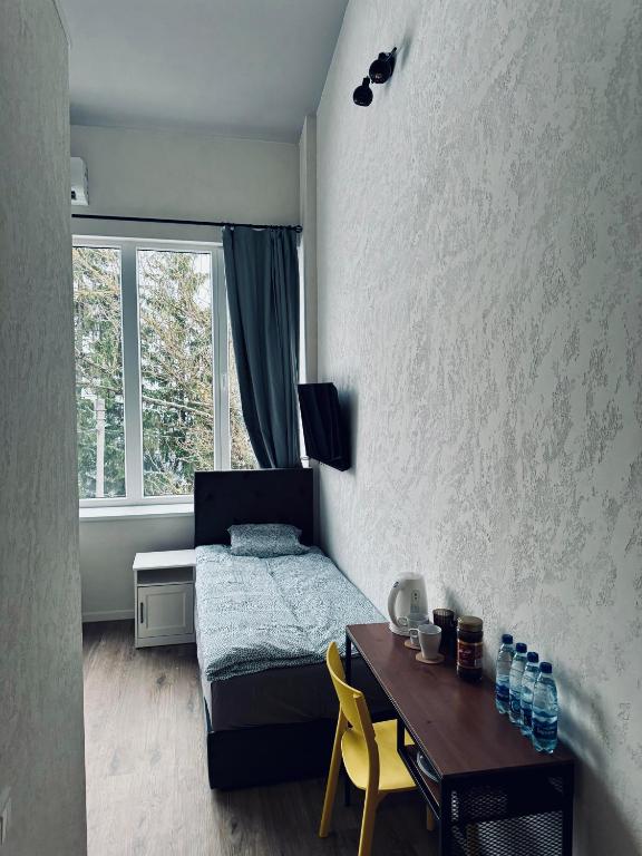 Postel nebo postele na pokoji v ubytování AJ Chocolate Vilnius